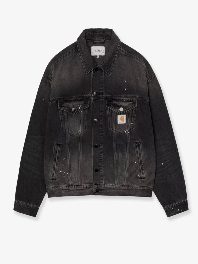 Black denim jacket with a distressed effect