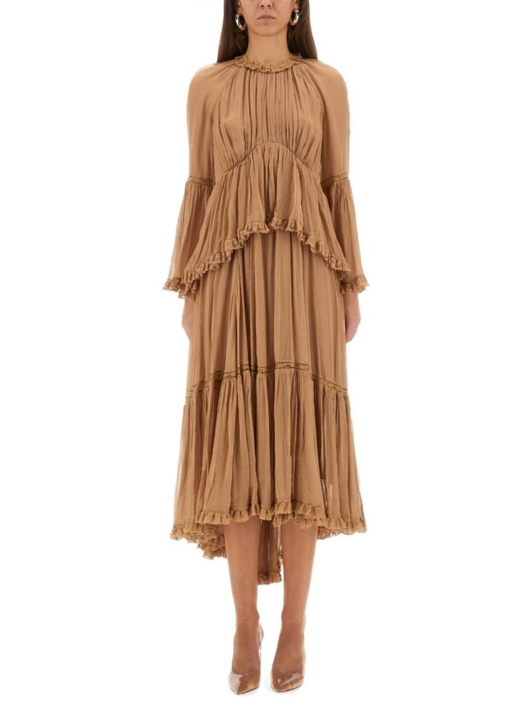 "HYPNOTIC PEPLUM" RUFFLE DRESS