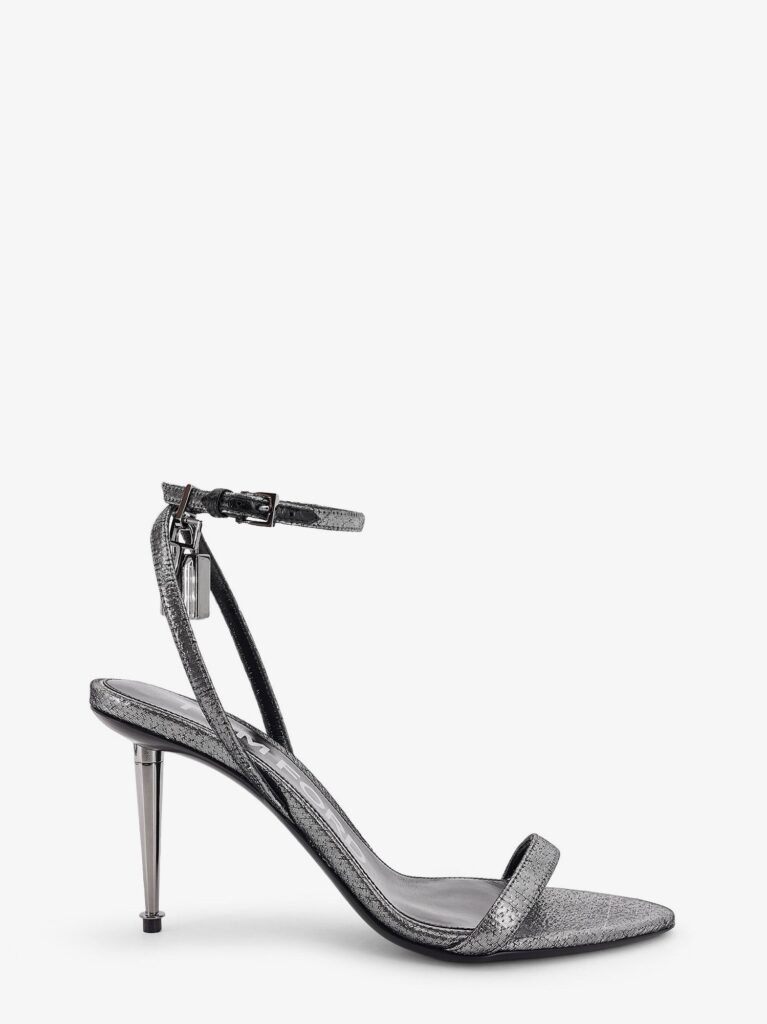 Laminated heeled sandals with laminated effect