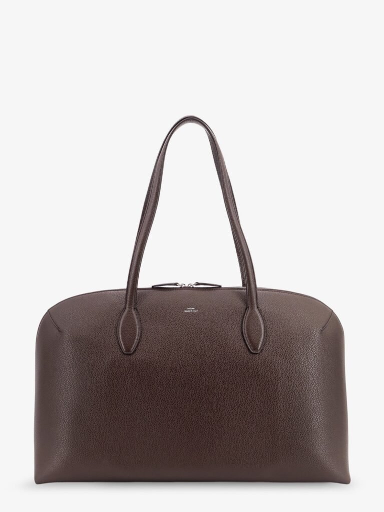 Suede handbag with engraved logo on the front