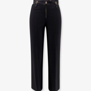 Trousers with logoed button