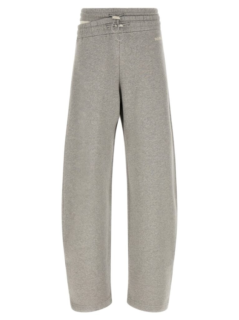 Asymmetrical double waist trousers